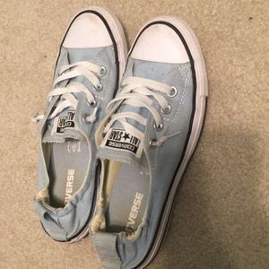 Blue slip on converse shoes